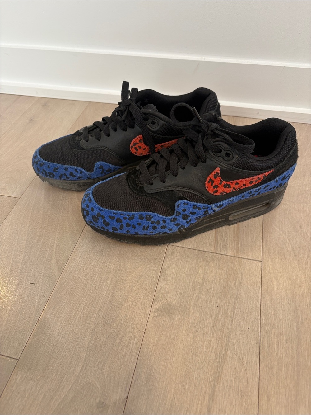 Nike Sneakers with Blue and Red Leopard Accents